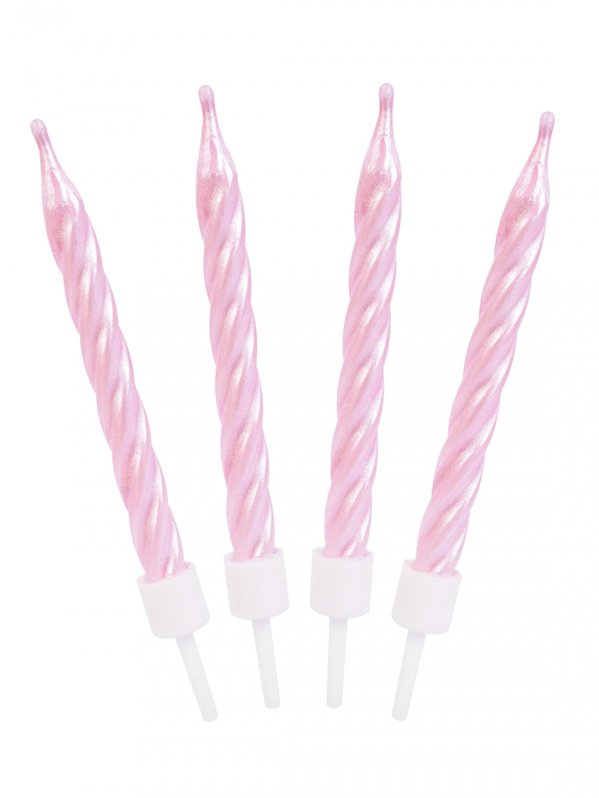 Gros plan des bougies d'anniversaire spirales roses nacrées