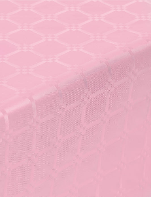 Détail des motifs de la nappe en rouleau papier damassé rose pastel