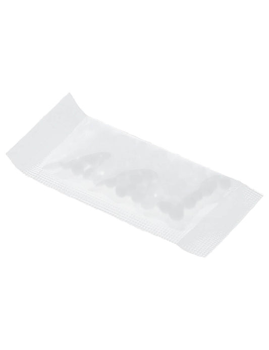 Détail du sachet de perles fixation thermique pour dentier