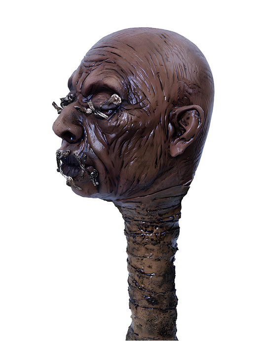 Vue de profil du sceptre tête vaudou luxe