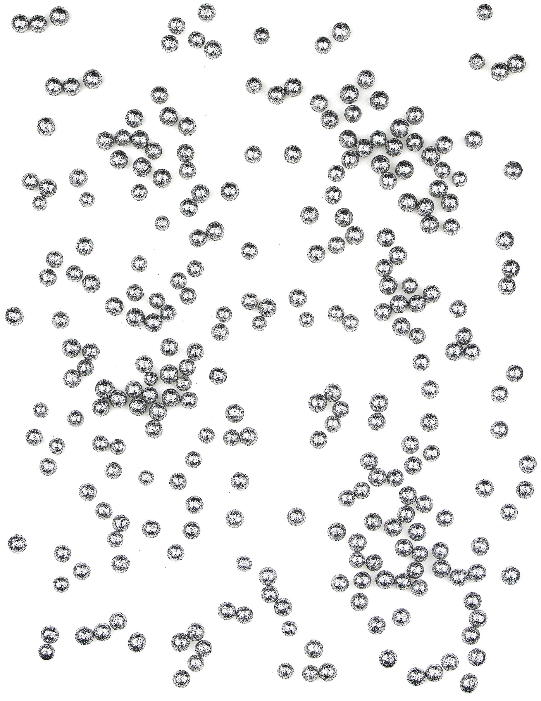 Gros plan sur les confettis de table mini boules pailletées argentées