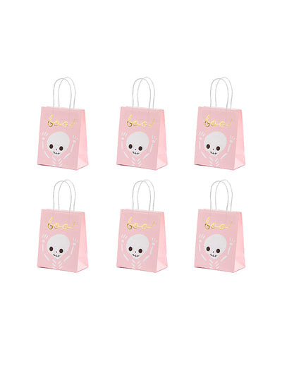 Sacs à bonbons boo pour Halloween roses et blancs avec motif squelette