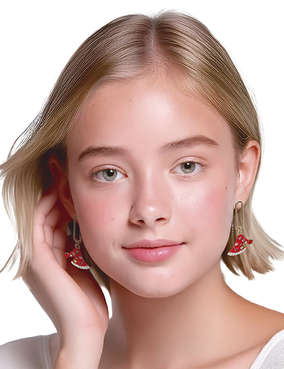 Gros plan sur les boucles d'oreilles métalliques chapeaux de Noël