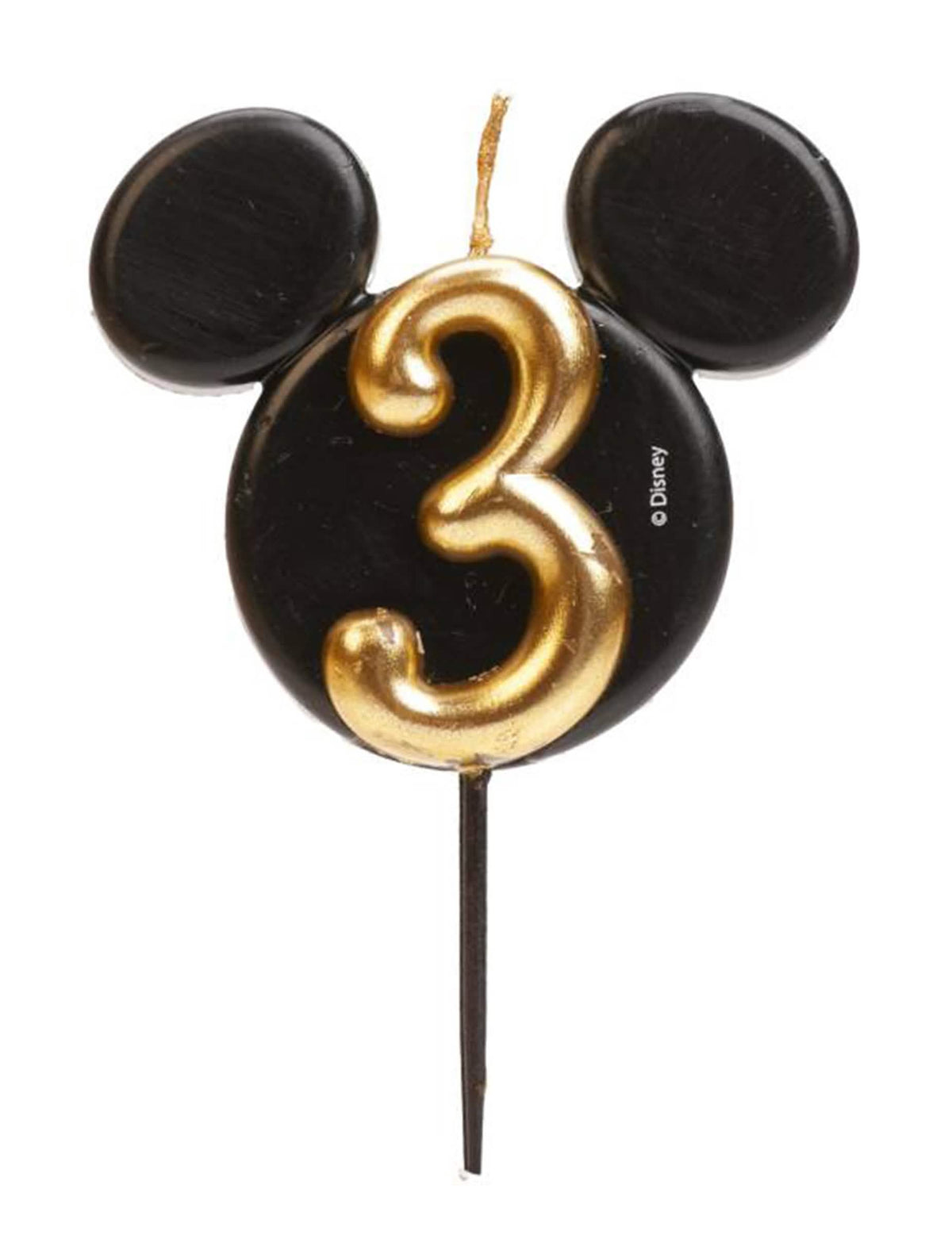 Gros plan sur le chiffre 3 doré de la bougie chiffre Mickey Mouse