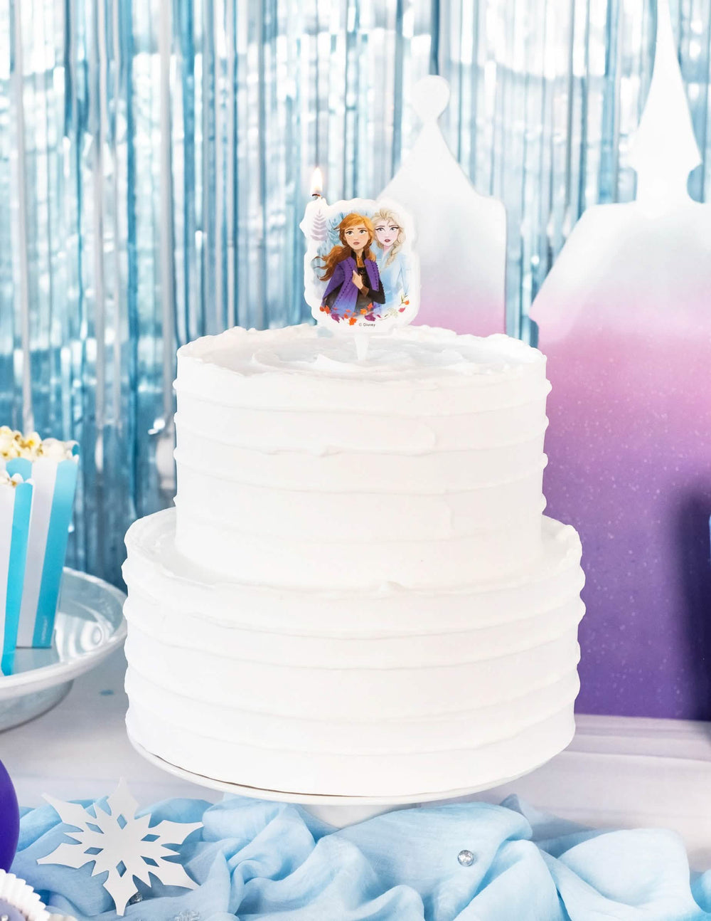 Kakkuasetelma synttärikynttilästä Frozen 2