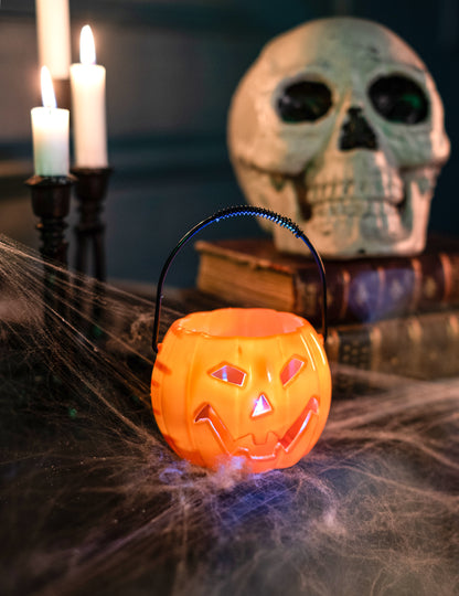 Valaiseva Halloween-kurpitsa 10 cm