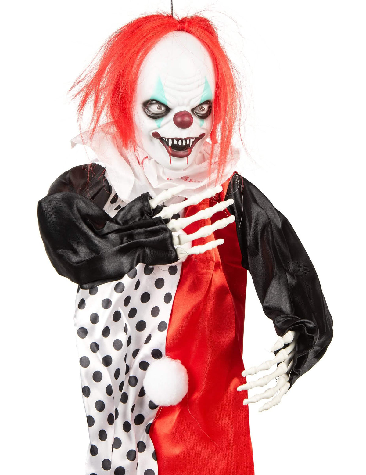Kummallinen kirkas pelle halloween-koristeeksi punaisilla hiuksilla ja luurankokäsillä