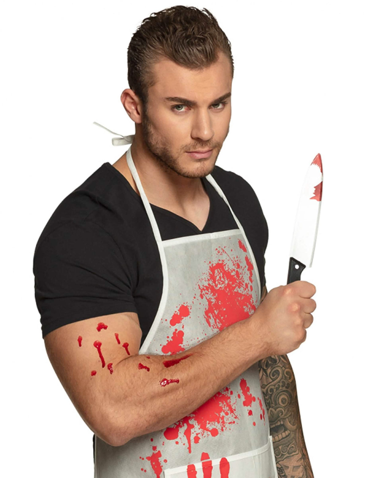Couteau ensanglanté tenu en main du couteau plastique Halloween