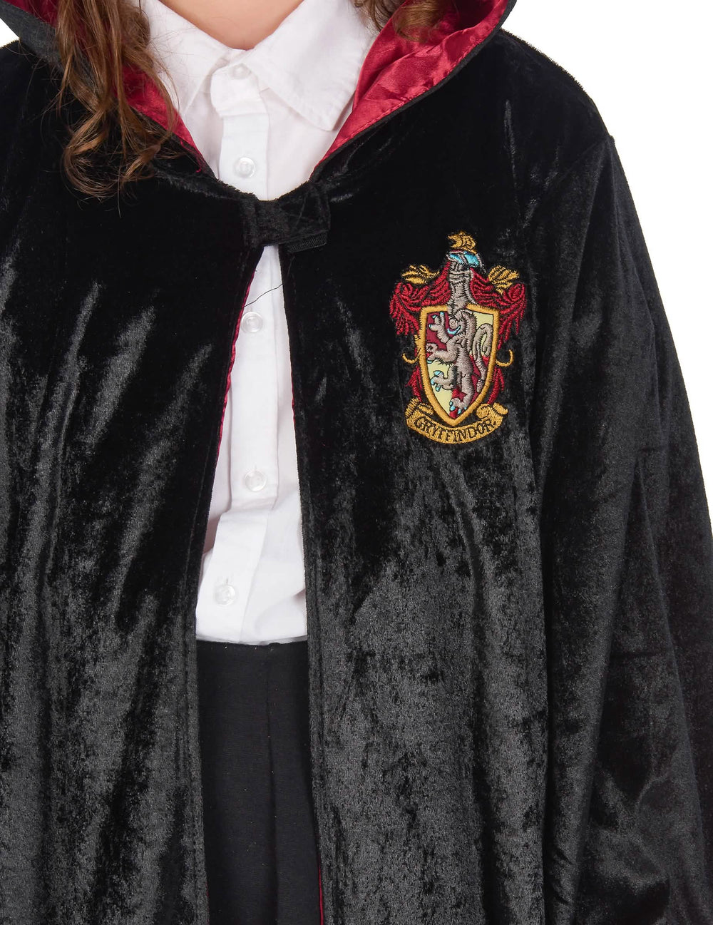 Lähikuva Gryffindorin vaakunasta lasten Harry Potter luksus -mekkoasussa