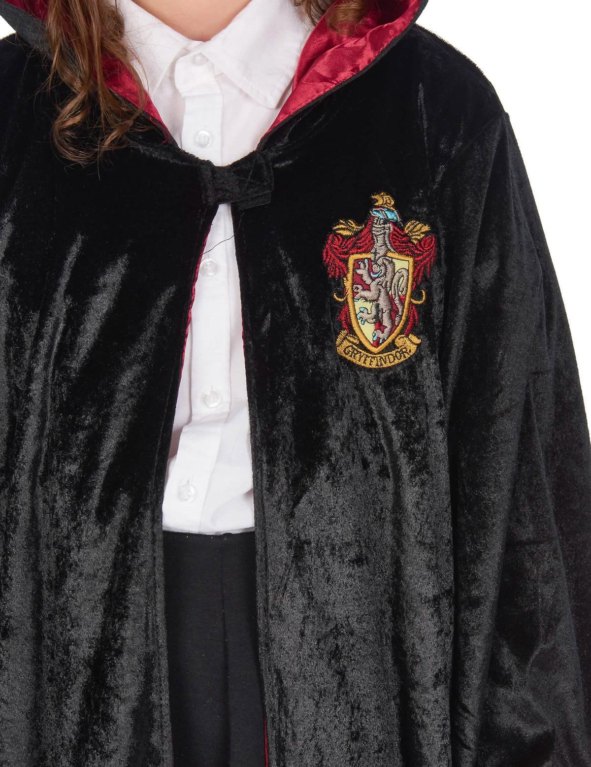 Lähikuva Gryffindorin vaakunasta lasten Harry Potter luksus -mekkoasussa
