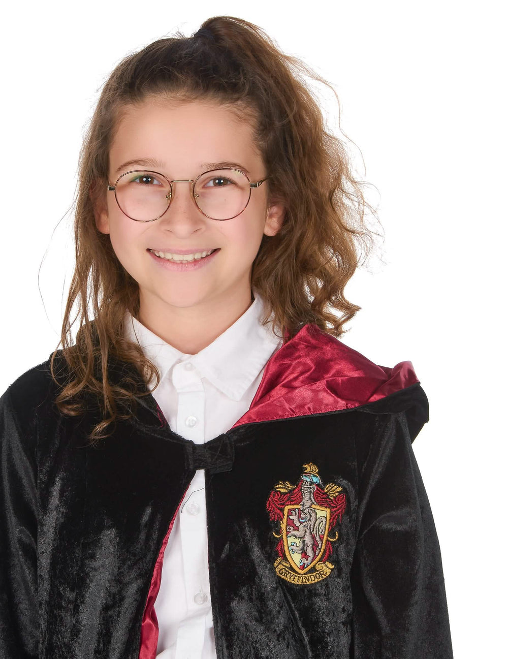 Lähikuva luksus Harry Potter -asun vaakunasta ja silmälaseista
