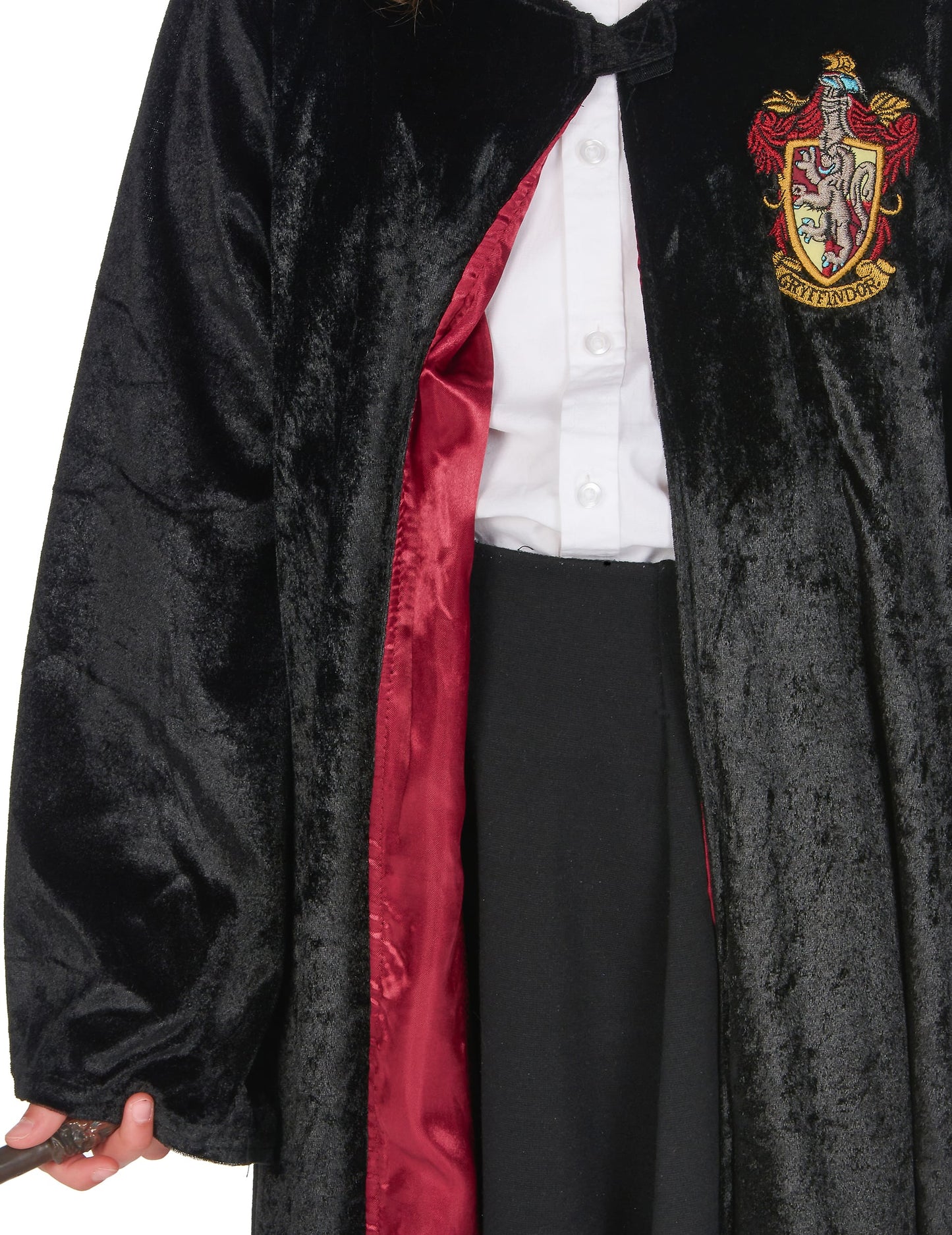 Gros plan sur la texture velours et la doublure du déguisement luxe robe Harry Potter