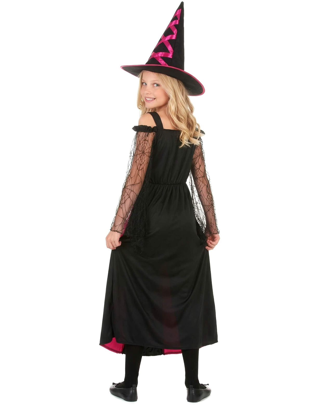 Takaa näkyvä kuva hammasreunaisesta halloween-noita-asusta