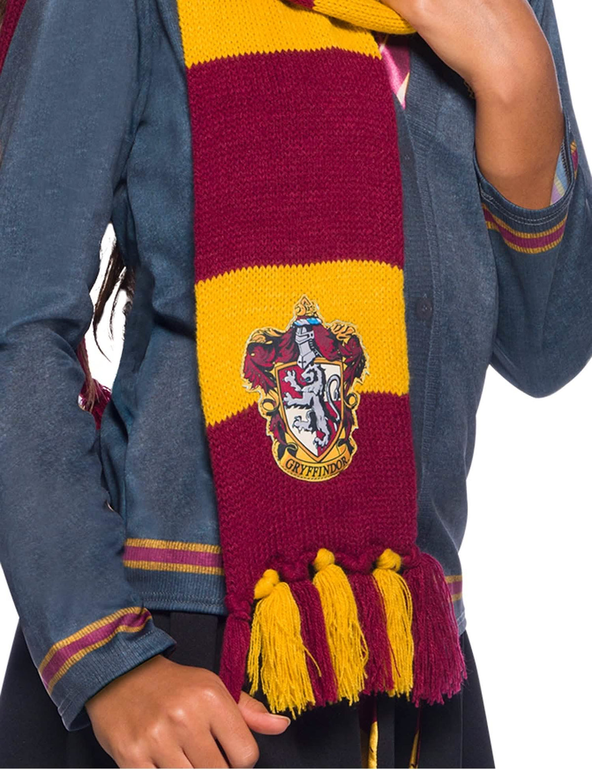 Gryffindor-luksus-huivin vaakunan ja hapsujen yksityiskohta