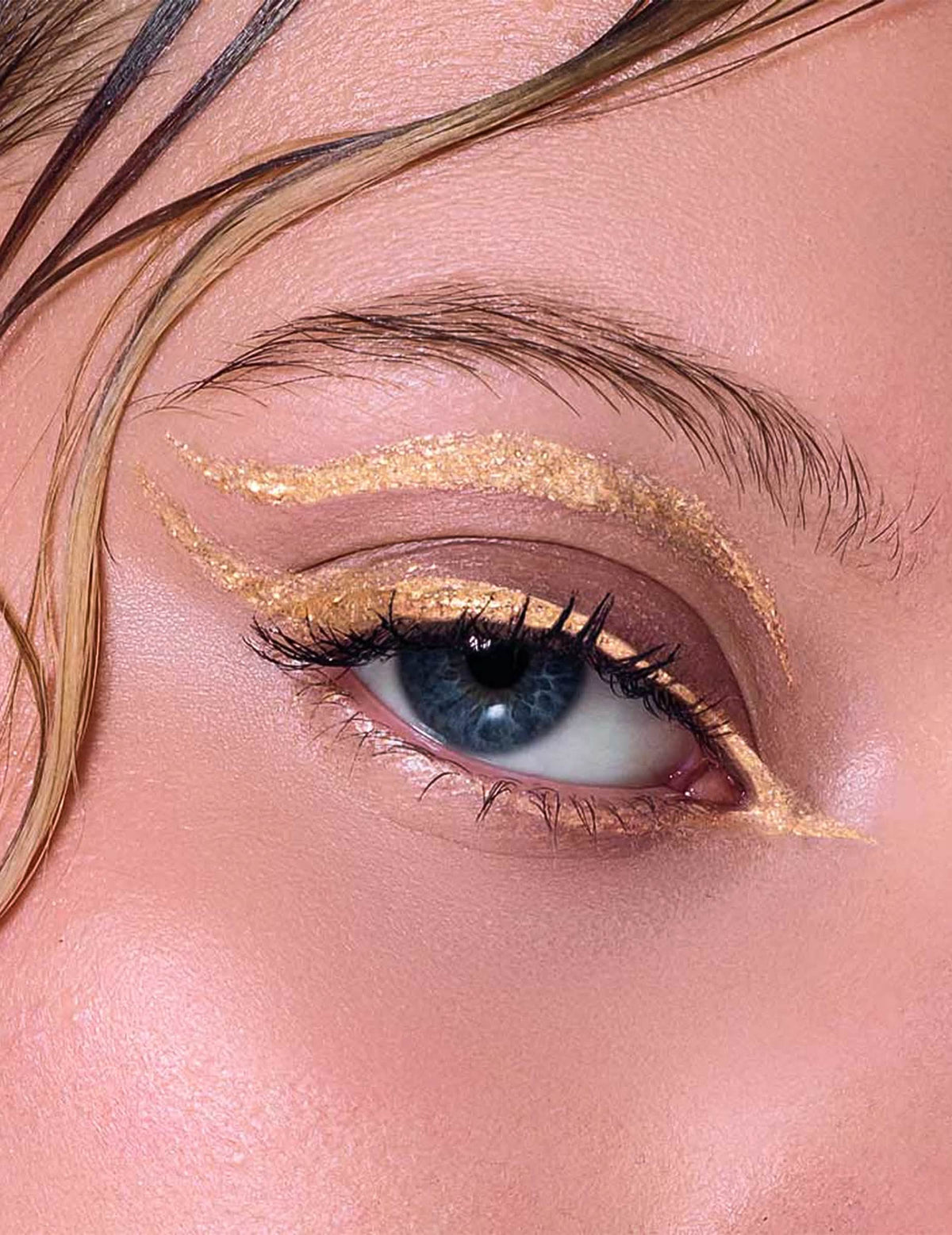 Metallinhohtoinen kultainen kimalle-eyeliner Si si la paillette™