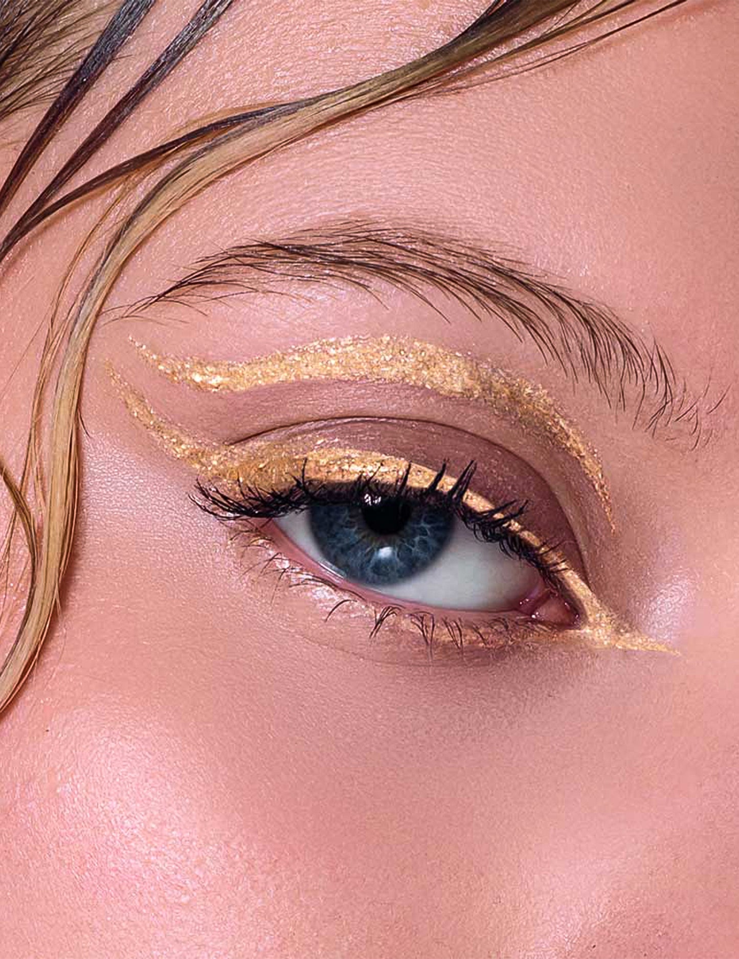 Metallinhohtoinen kultainen kimalle-eyeliner Si si la paillette™
