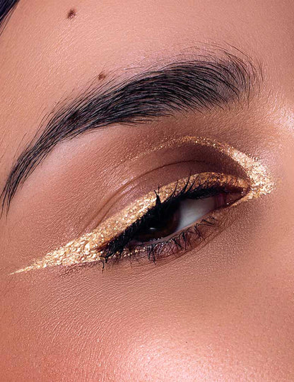 Metallinhohtoinen kultainen kimalle-eyeliner Si si la paillette™