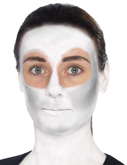 Détail du maquillage blanc du visage du kit maquillage squelette coloré
