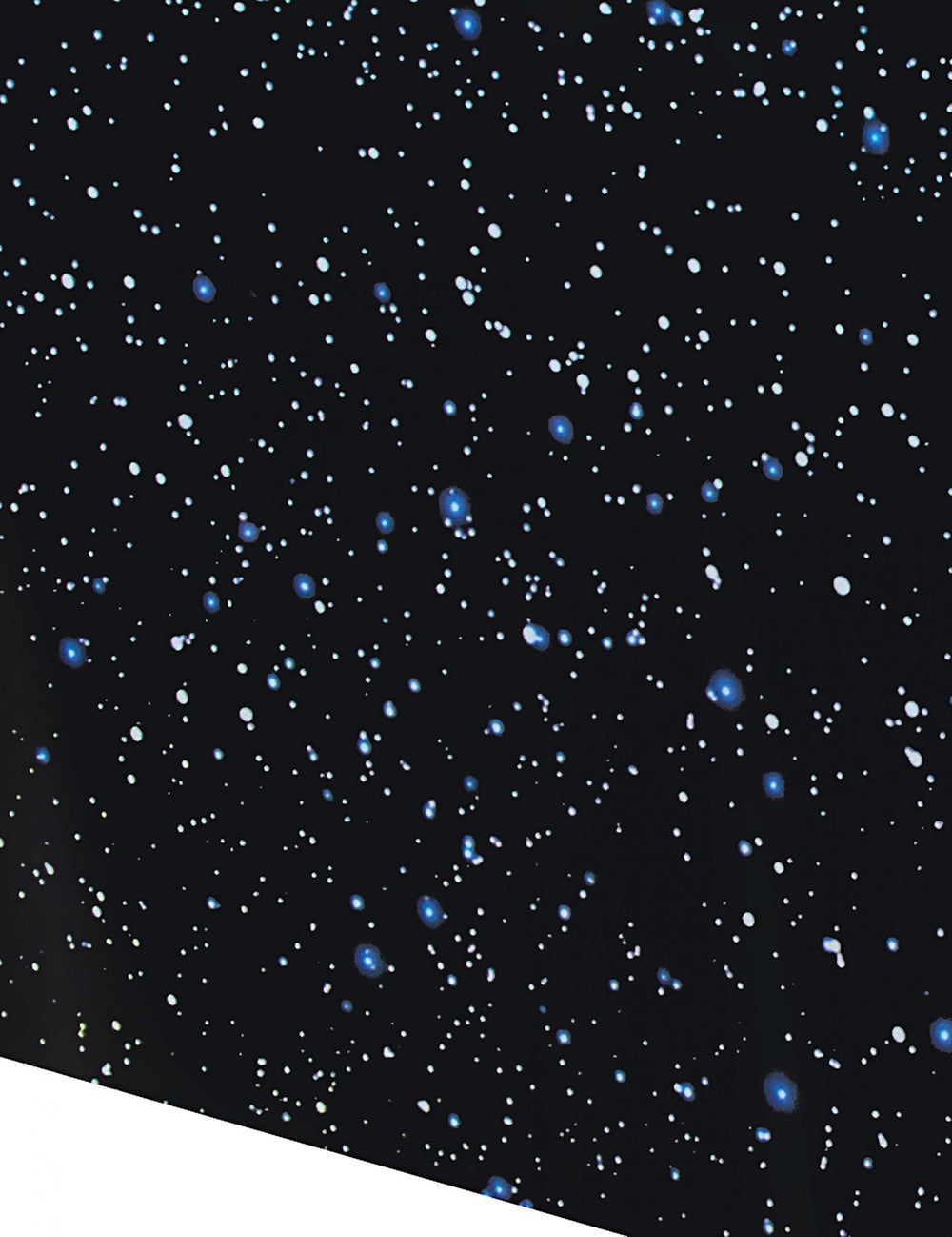 Gros plan sur le motif ciel étoilé de la nappe en plastique espace pour anniversaire