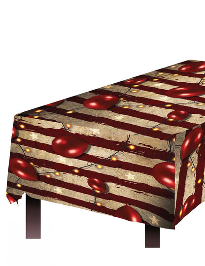 Nappe en plastique circus terrifiant rouge et beige avec ballons et guirlandes