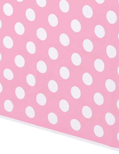Détail du motif de la nappe décoration rétro rose à pois blancs en plastique