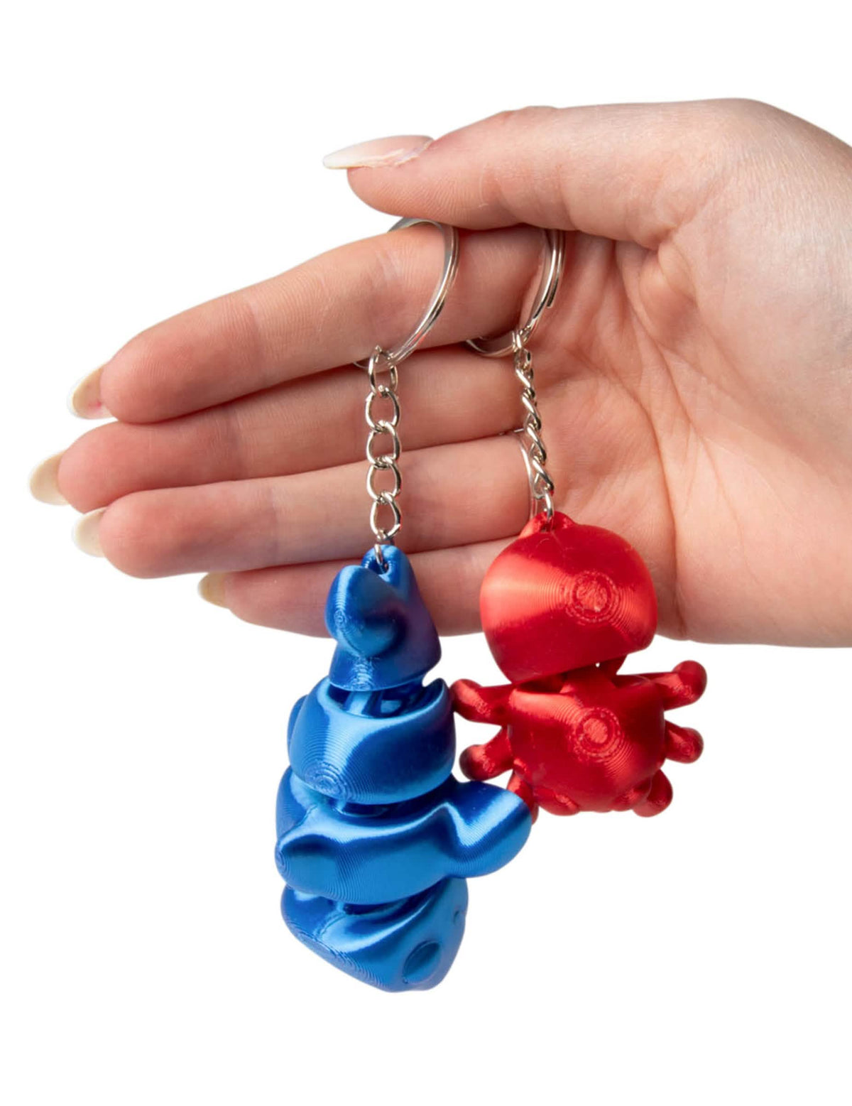 Figurines tenues dans la main du porte-clés petits animaux colorés et articulés