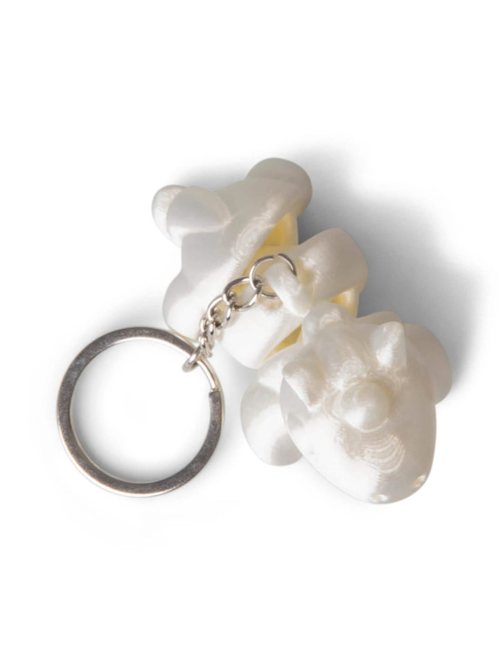 Figurine de dragon blanc nacré du porte-clés petits animaux colorés et articulés