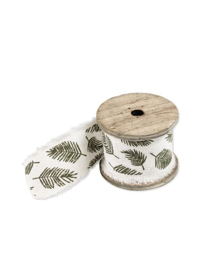 Mise en situation sur des couverts du ruban en lin feuilles tropicales
