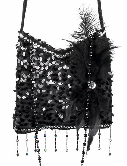 Détail des paillettes et de la plume du sac charleston années 20
